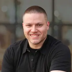 photo of Stephen Box wearing a black polo shirt